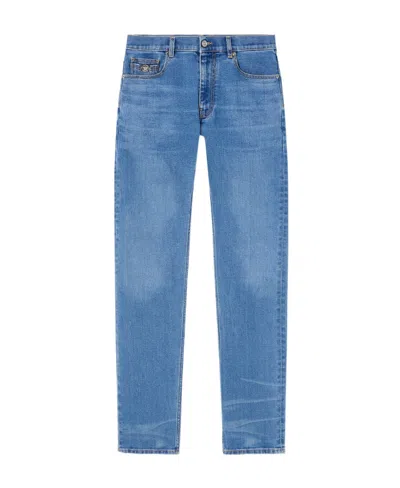 Versace Medusa Head-embellished Mid-rise Slim-fit Jeans In Blue
