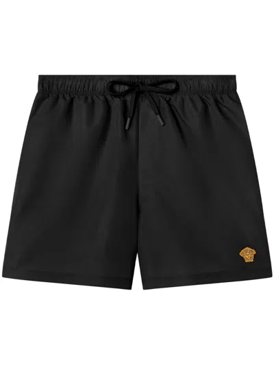 VERSACE MEDUSA-EMBROIDERED SWIM SHORTS