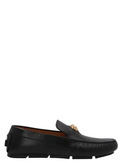 Versace Logo Plaque Leather Loafers In Black