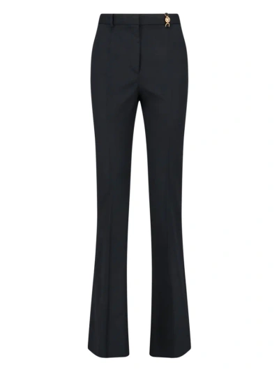 Versace Medusa Plaque Pleated Trousers In Black