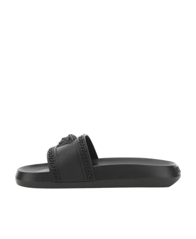 VERSACE VERSACE MEDUSA EMBOSSED SLIP-ON SLIDES