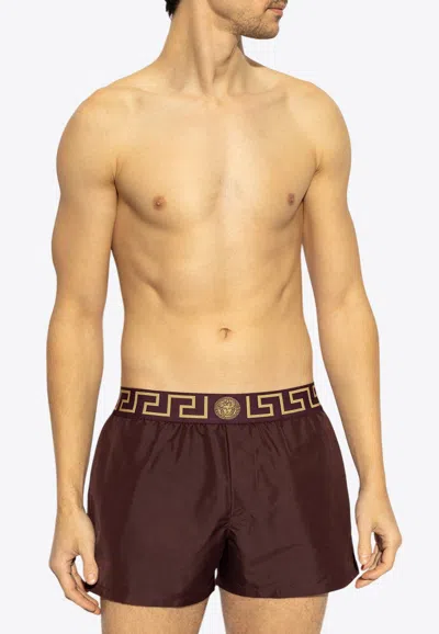 Versace Medusa Waistband Swim Shorts In Purple