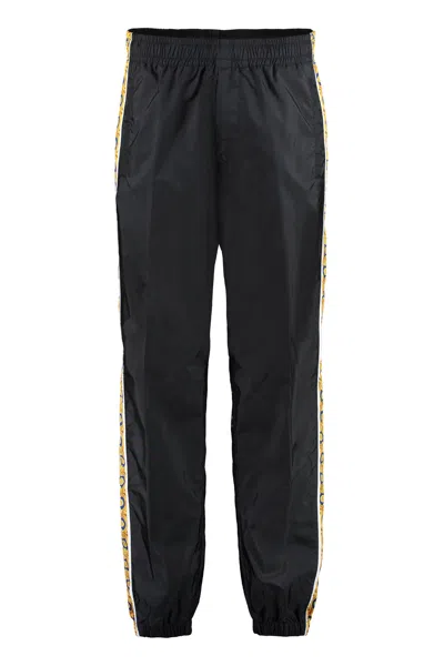 Versace Graphic-stripe Taffeta Track Pants In Nero