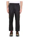 Versace Graphic-stripe Taffeta Track Pants In Black