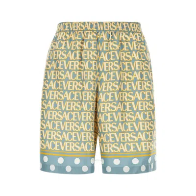 VERSACE VERSACE MEN'S ALL-OVER LOGO PRINT SHORTS