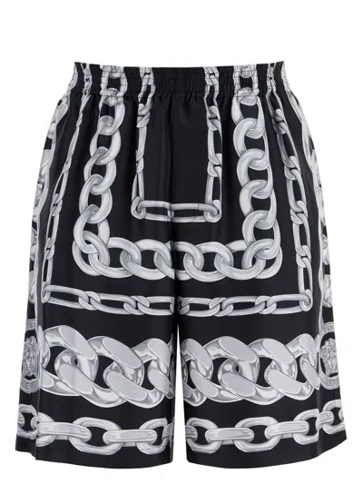 VERSACE MEN'S PRINTED SILK SHORTS