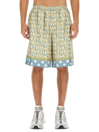 Versace Shorts With Logo In Light Blue Ivory