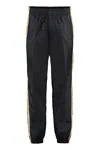 Versace Graphic-stripe Taffeta Track Pants In Black