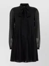 Versace Mini Dress With Pleated Skirt And Sheer Sleeves In Black