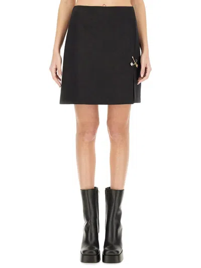 VERSACE VERSACE MINI SKIRT "SAFETY PIN"
