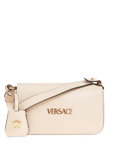 Versace Mini Tag Logo Charm Crossbody Bag In Neutral