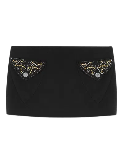 VERSACE MINISKIRT WITH DECORATED POCKETS