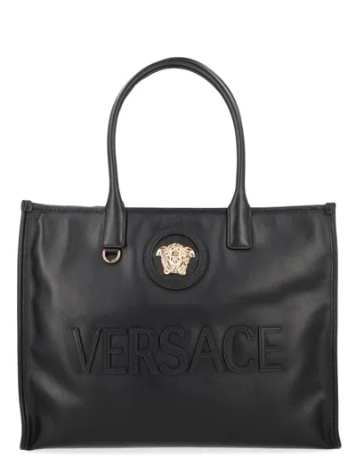 Versace Neutrals Raised Logo Textured Calf Leather Tote Bag In Black