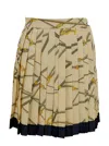 VERSACE VERSACE PALE YELLOW PLEATED MINI SKIRT WITH ALL-OVER LOGO PRINT IN SILK BLEND WOMAN