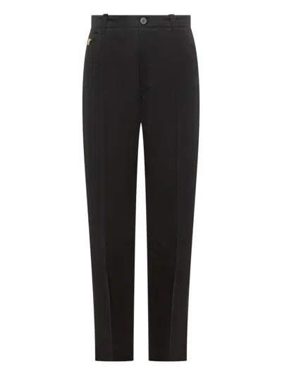 VERSACE VERSACE PANTS WITH MEDUSA HEAD PLAQUE