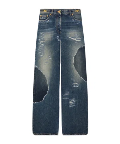 VERSACE VERSACE LOGO-PATCH DISTRESSED JEANS