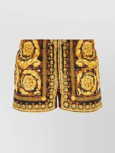 VERSACE PATTERNED SWIM TRUNKS WITH MULTIPLE POCKETS