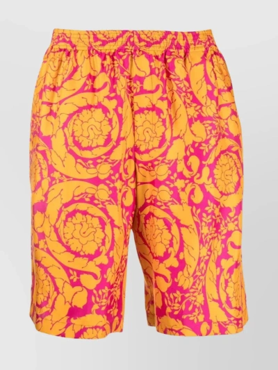 VERSACE PRINTED KNEE-LENGTH SHORTS WITH ELASTICATED WAISTBAND