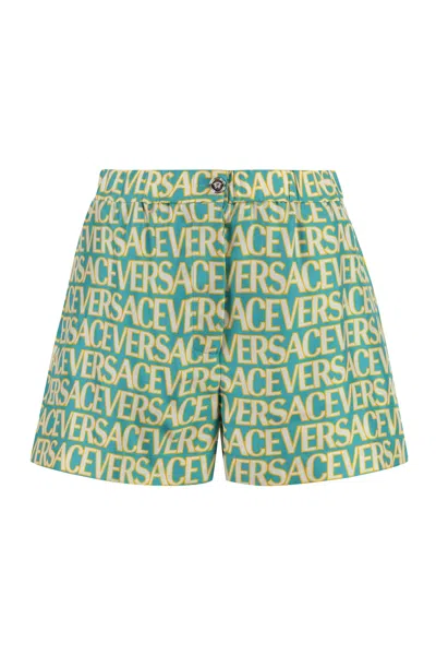 Versace Printed Silk Shorts In Light Blue