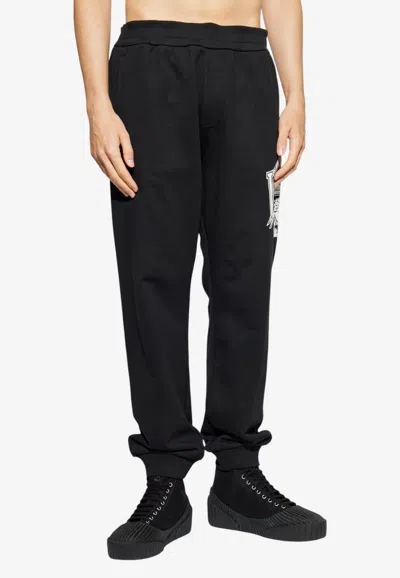 Versace Printed Track Pants In Black