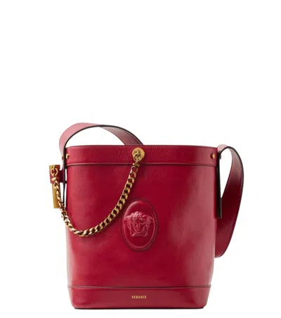 Versace Pivot Small Leather Bucket Bag In Red