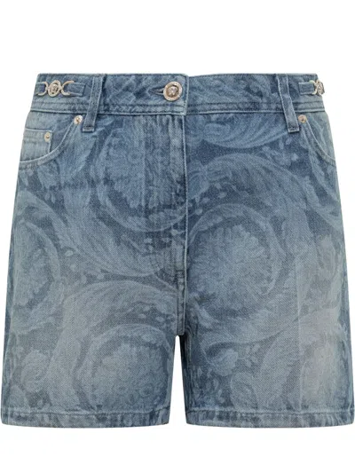 VERSACE VERSACE SHORTS IN DENIM WITH BAROQUE SILHOUETTE PATTERN
