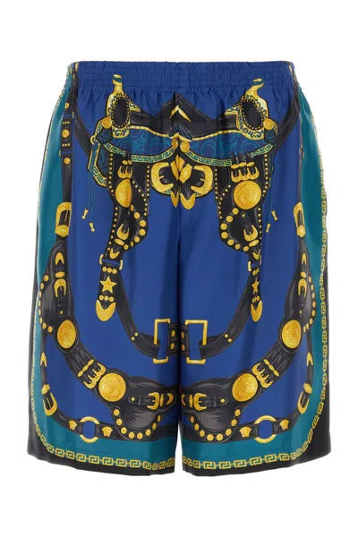 VERSACE BLUE SHORTS WITH HARNESS PRINT IN SILK MAN