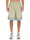 Versace Silk Bermuda Shorts With All-over Logo