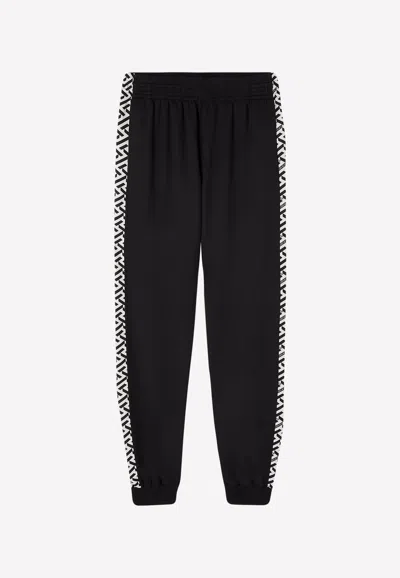 Versace Signature Greca Print Sports Pants In Black