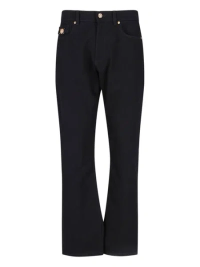 Versace Black Straight Leg Jeans With Medusa Detail And Gold-tone Accents For Men