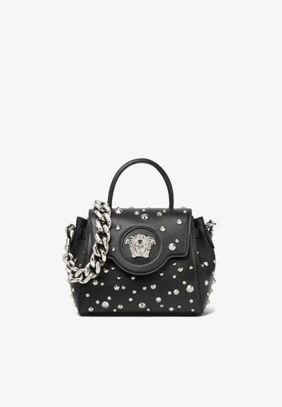 Versace Small La Medusa Spiked Top Handle Bag In Black