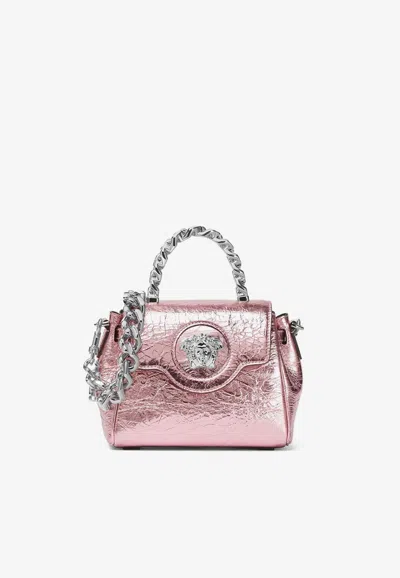 Versace Small Medusa Top Handle Bag In Metallic Leather In Pink