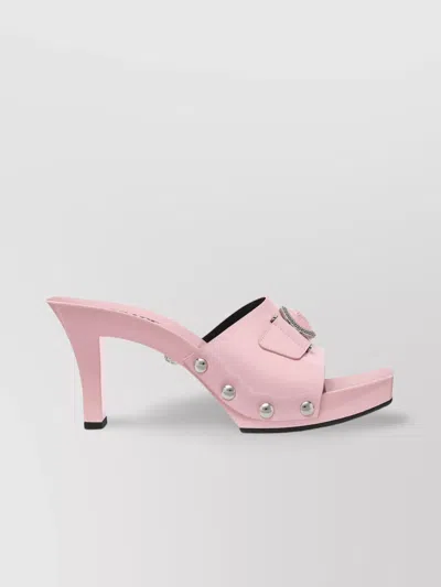 VERSACE SQUARE BACK PATENT MULES WITH STUD DETAILING