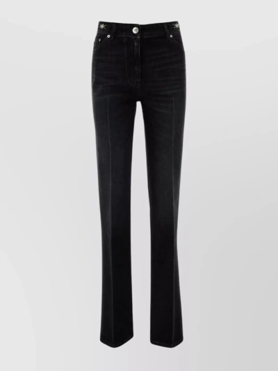 Versace Stonewashed Denim Trousers With Embroidered Back Pocket In Black