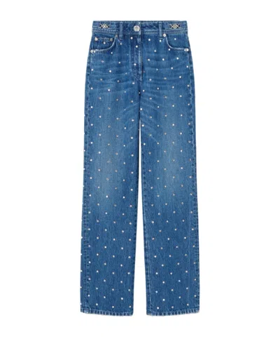 VERSACE VERSACE LOGO-PATCH STUD EMBELLISHED JEANS