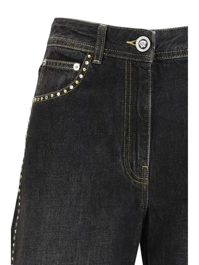 Versace Studded And Crystal-embellished Jeans In Black