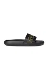 Versace Studded-logo Leather Slides In Black
