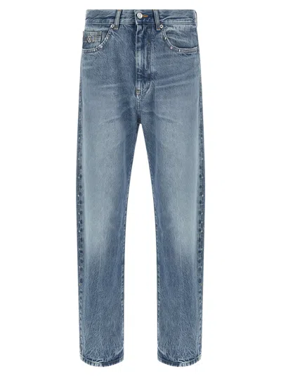 Versace Studded Medusa Jeans In Black