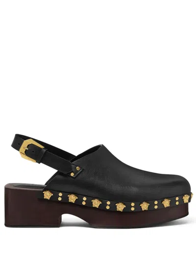 Versace Studded Stack Clogs In Black+gold