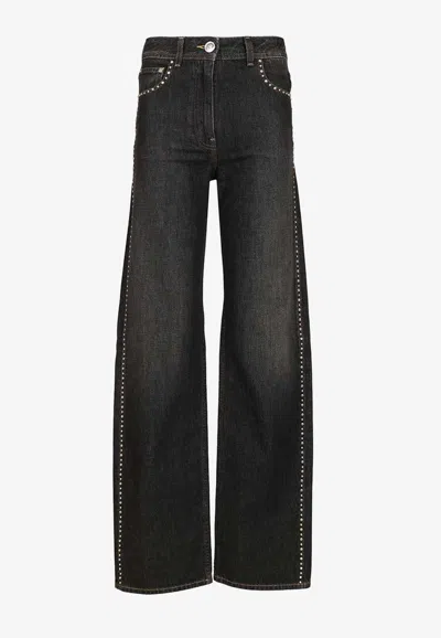 Versace Stud-embellished Faded Jeans In Black