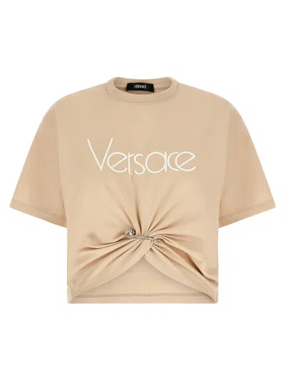 Versace Logo Twist Safety-pin Crop T-shirt In Beige