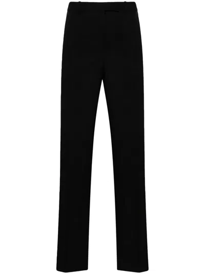 Versace Tailored Virgin Wool Trousers In Schwarz