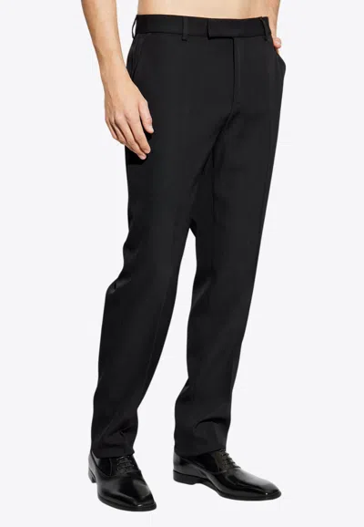 Versace Tailored Wool Tapered Pants In Black