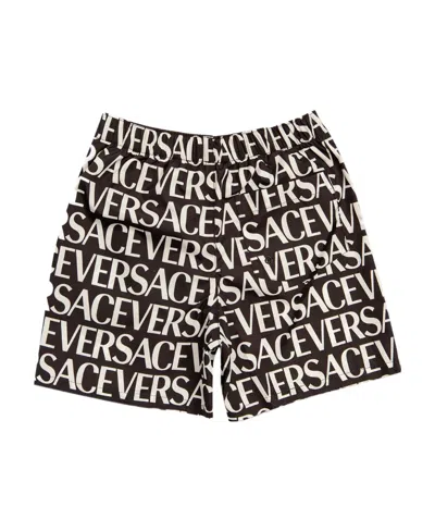 Versace Teen Repeated Logo-print Swim Shorts In Black