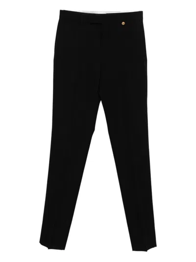 Versace Wool Trousers In Black
