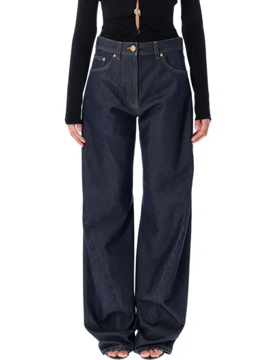 VERSACE VERSACE TWISTED BAGGY JEANS