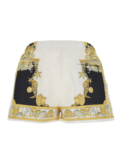 VERSACE WHITE SWIM SHORTS WITH ELASTIC DRAWSTRING WAIST AND CORAL THEATRE PRINT IN TECH FABRIC MAN