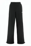 Versace Wide-leg Jogger Pants With Adjustable Hem And Embroidered Branding In Black