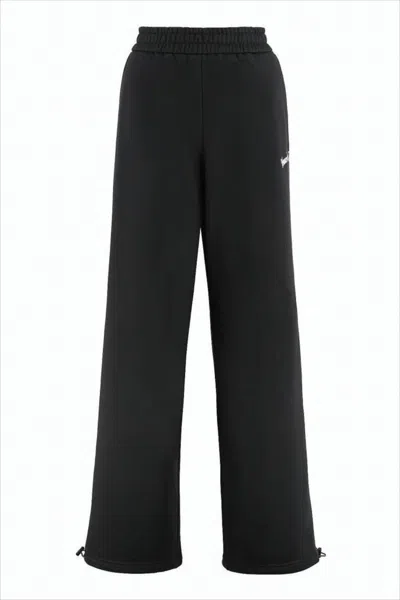 Versace Wide-leg Jogger Pants With Adjustable Hem And Embroidered Branding In Black