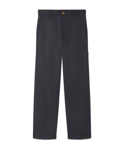 Versace Wool Trousers In Black